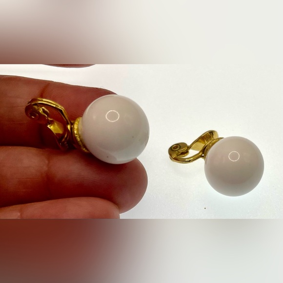 Vintage Signed Monet Gold Tone White
Lucite Ball Clip On Earrings - Picture 5 of 9